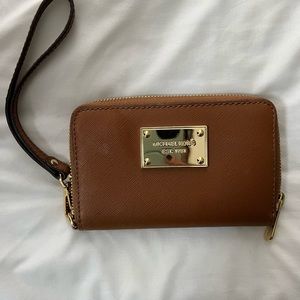 Michael Kor’s wallet/ wristlet